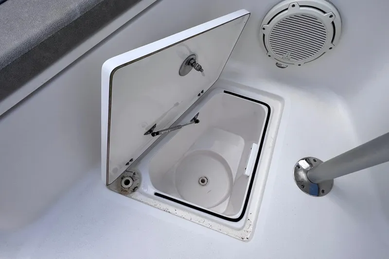 Slide: The Image of Open storage compartment on 2019 Sea Fox 328 Commander boat deck. - 55