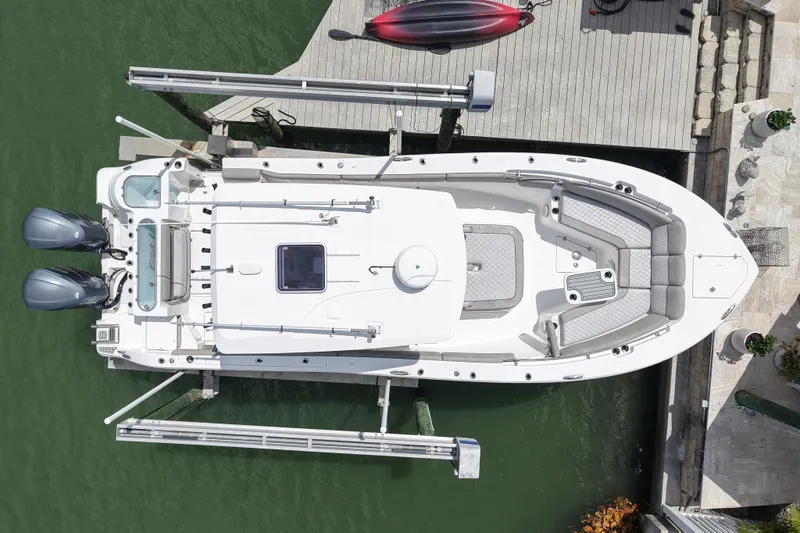 Slide: The Image of Aerial view of 2019 Sea Fox 328 Commander boat docked at a marina. - 6