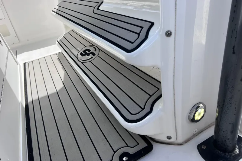 Slide: The Image of Non-slip steps on a 2019 Sea Fox 328 Commander boat, featuring sleek design and lighting. - 60