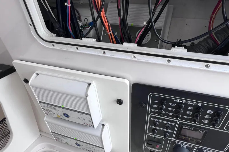 Slide: The Image of Electrical panel and wiring inside a 2019 Sea Fox 328 Commander boat. - 68