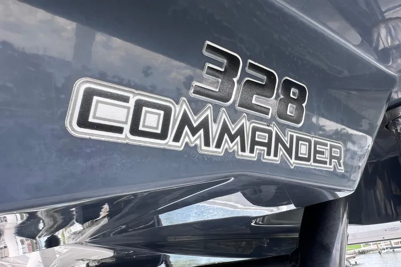 Slide: The Image of Close-up of 2019 Sea Fox 328 Commander boat model name on hull. - 70
