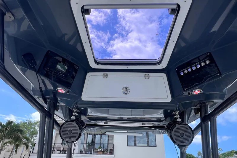 Slide: The Image of Interior view of 2019 Sea Fox 328 Commander boat with skylight and speakers. - 76