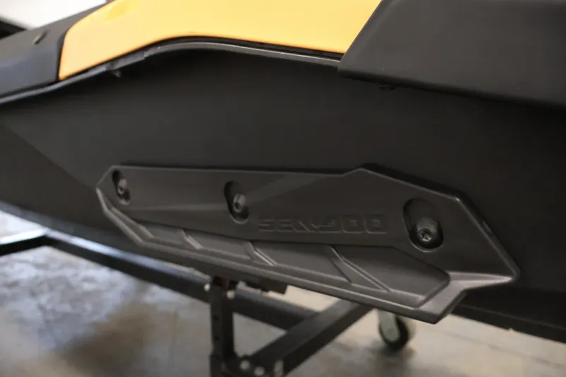 Slide: The Image of 2025 Sea-Doo Spark 2up jet ski close-up, showcasing sleek black and yellow design. - 19