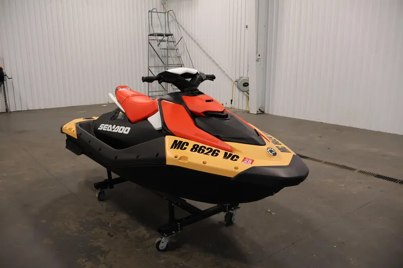 Slide: The Image of 2025 Sea-Doo Spark 2up jet ski in a garage setting. - 3