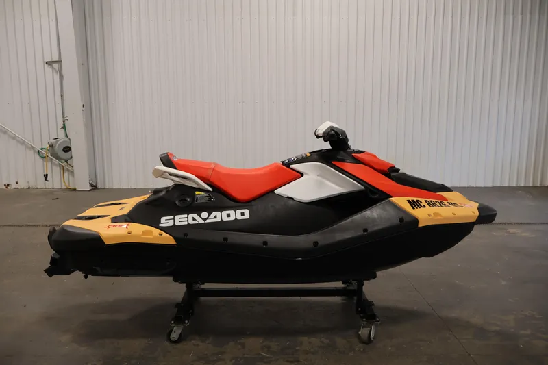 Slide: The Image of 2025 Sea-Doo Spark 2up jet ski in a garage setting. - 4