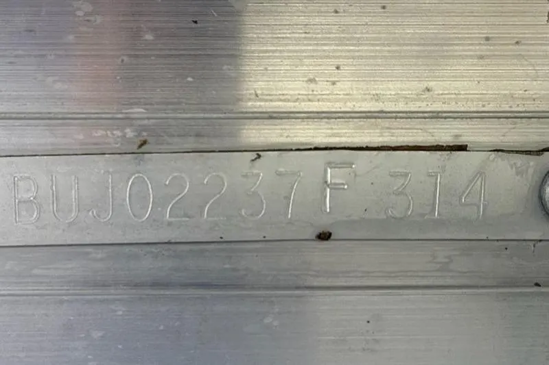 Slide: The Image of Hull identification number on 2014 Sun Tracker Bass Buggy 18 DLX boat. - 13