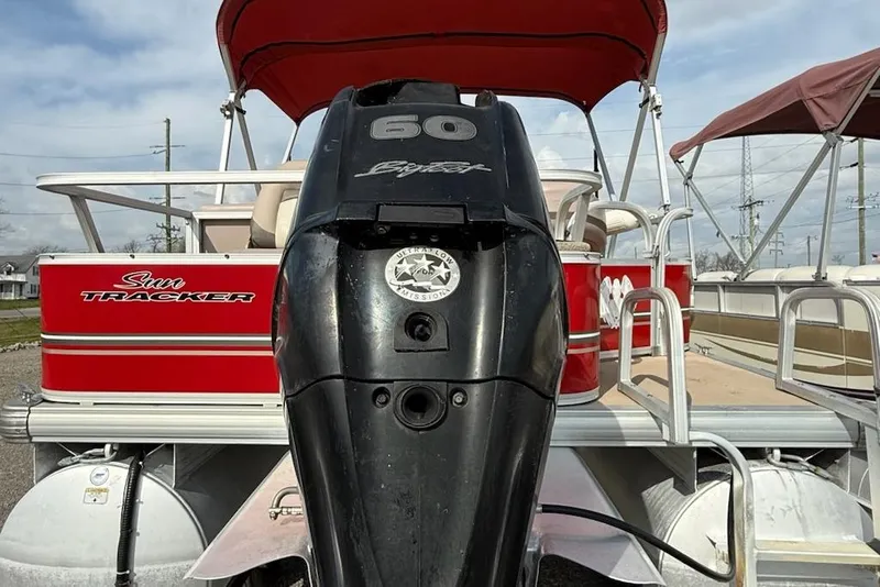 Slide: The Image of 2014 Sun Tracker Bass Buggy 18 DLX pontoon boat with a 60 HP engine. - 6