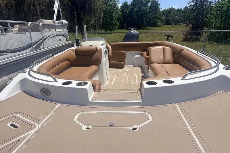 Slide: The Image of 2014 Hurricane SunDeck Sport 201 OB boat with spacious seating and sleek design. - 8