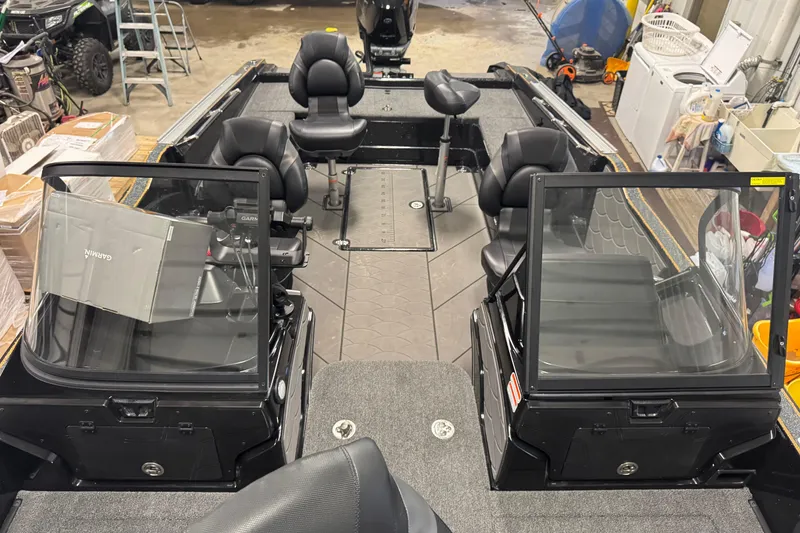 Slide: The Image of Interior view of a 2026 Nitro ZV21 boat with seating and equipment. - 22