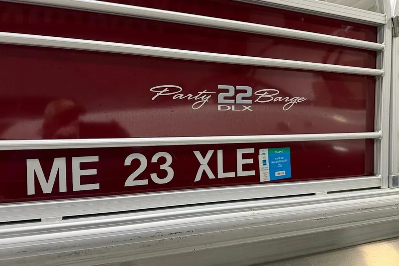 Slide: The Image of SUNTRACKER 22 DLX pontoon boat with registration ME 23 XLE, 2022 model. - 17