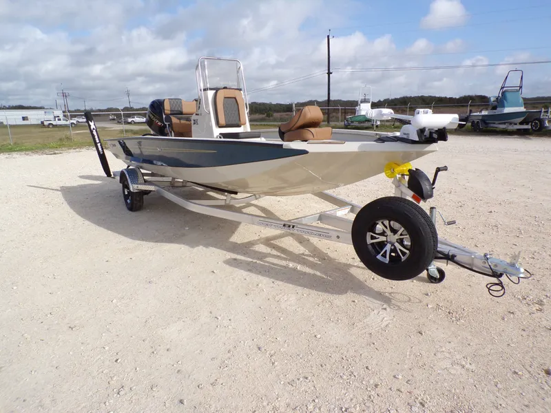 Slide: The Image of 2026 Xpress H20BAY boat on trailer, ready for adventure. - 10