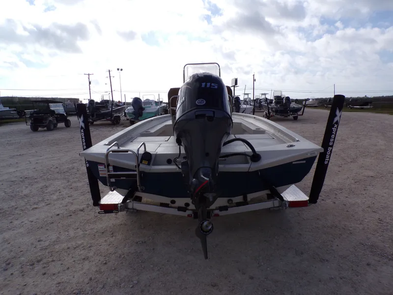 Slide: The Image of Rear view of a 2026 Xpress H20BAY boat on a trailer. - 13