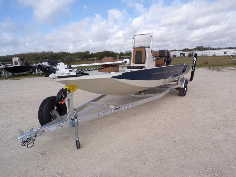 Slide: The Image of 2026 Xpress H20BAY boat on trailer, ready for adventure. - 8