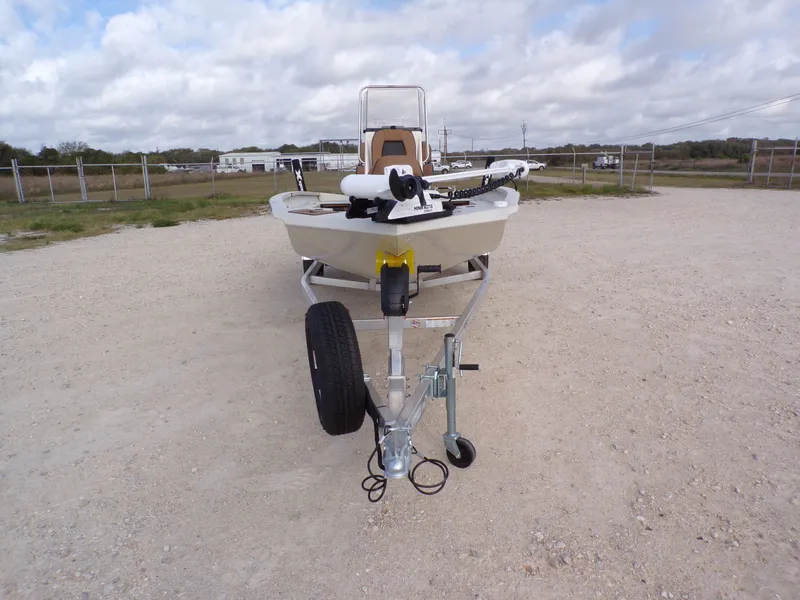 Slide: The Image of 2026 Xpress H20BAY boat on trailer, front view on gravel lot. - 9