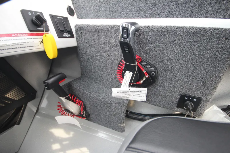 Slide: The Image of 2025 Weldcraft 240 Maverick DV boat controls and dashboard details. - 24