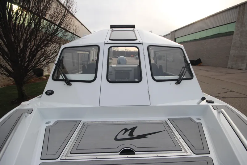 Slide: The Image of 2025 Weldcraft 240 Maverick DV boat exterior, showcasing sleek design and windshield. - 35