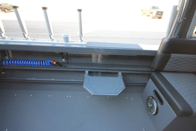 Slide: The Image of Interior of 2027 Weldcraft 240 Maverick DV boat with seating and storage features. - 20