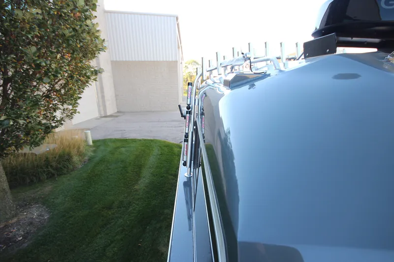 Slide: The Image of Side view of a 2027 Weldcraft 240 Maverick DV boat near a building. - 43