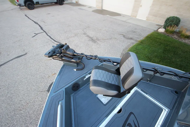 Slide: The Image of 2027 Weldcraft 240 Maverick DV boat with Garmin equipment and cushioned seating. - 40