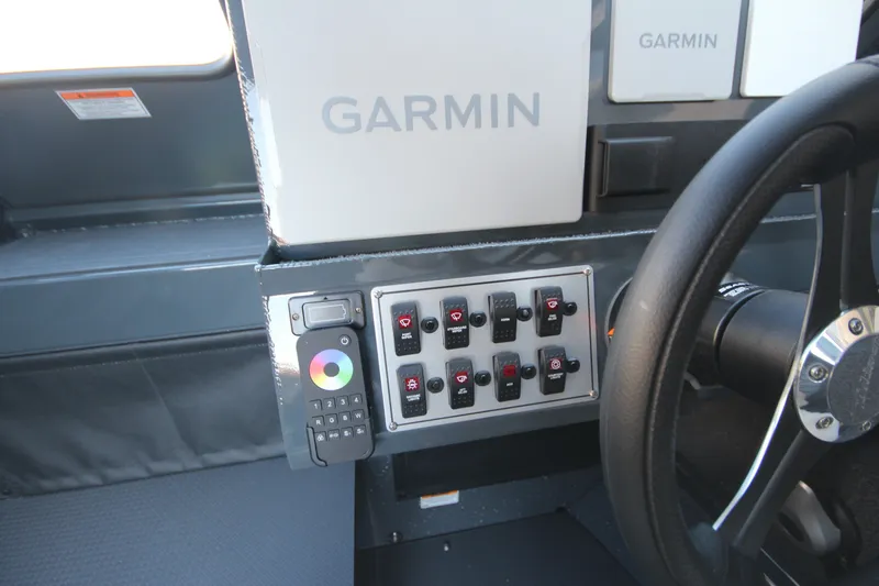 Slide: The Image of Control panel of 2027 Weldcraft 240 Maverick DV boat with Garmin navigation system. - 31