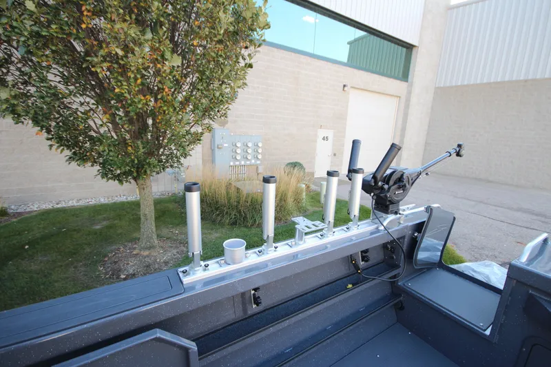 Slide: The Image of 2027 Weldcraft 240 Maverick DV boat with rod holders and fishing equipment. - 15