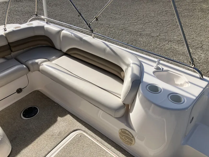 Slide: The Image of Interior of a 2004 Hurricane 201 GS boat with seating area. - 19