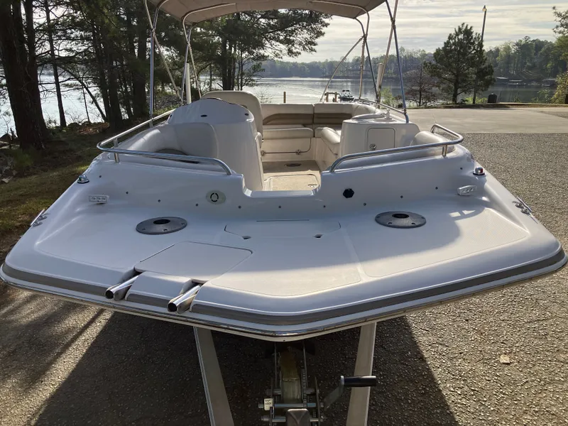 Slide: The Image of 2004 Hurricane 201 GS boat parked by the lakeside. - 2