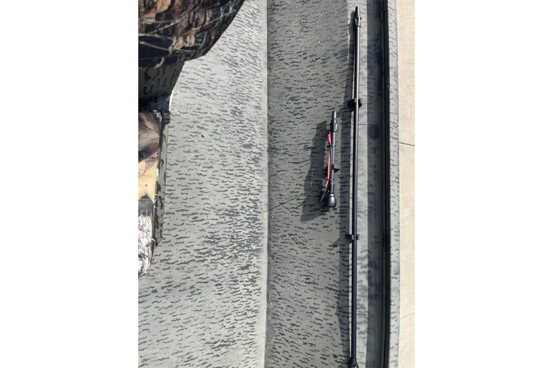 Slide: The Image of Top view of 2026 War Eagle 961 Blackhawk boat interior with camouflage pattern. - 16