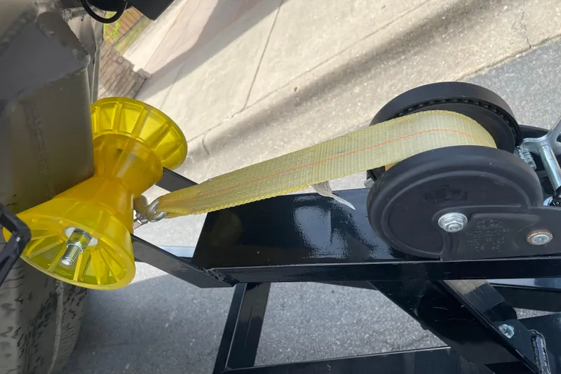 Slide: The Image of Close-up of War Eagle 961 Blackhawk 2026 trailer winch and strap mechanism. - 5