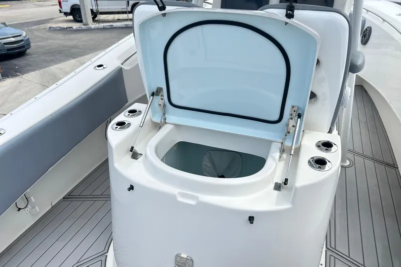 Slide: The Image of Open storage compartment on 2015 Cape Horn 32 XS boat deck. - 16