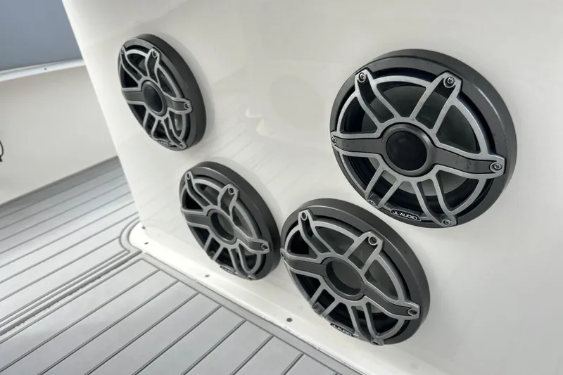 Slide: The Image of Four JL Audio speakers on a 2015 Cape Horn 32 XS boat deck. - 9