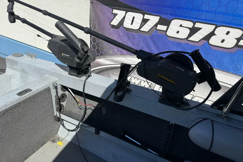 Slide: The Image of Jetcraft 1925 Adventurer 2008 boat with Cannon downriggers, featuring a sleek fishing setup. - 15