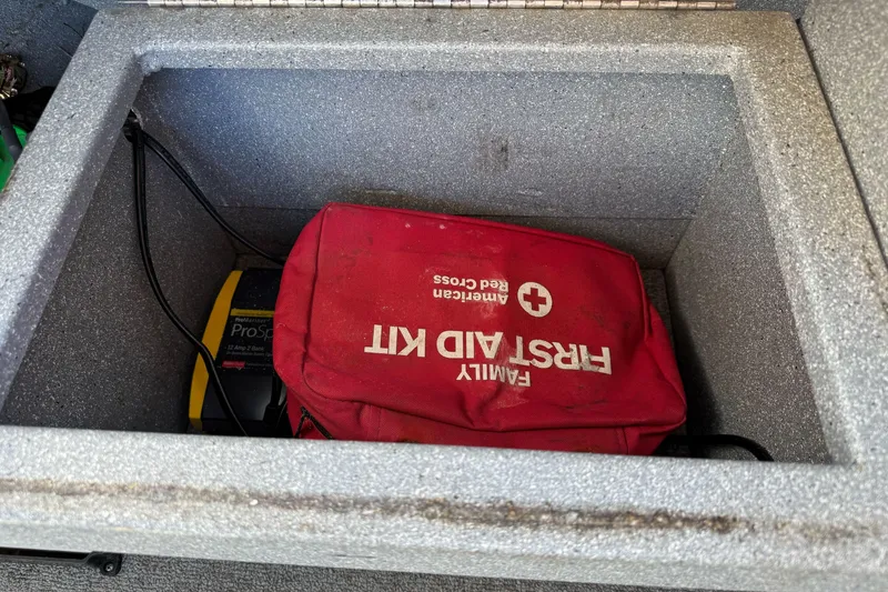 Slide: The Image of Red first aid kit inside Jetcraft 1925 Adventurer boat compartment, 2008 model. - 23
