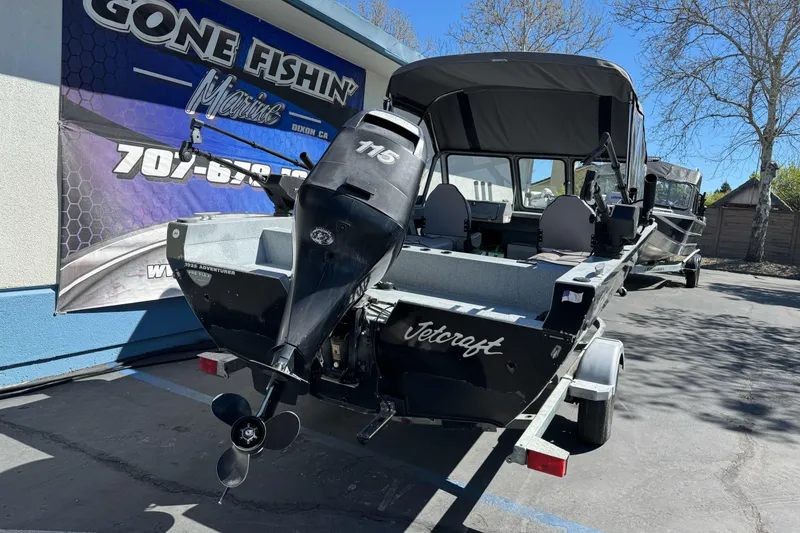 Slide: The Image of Jetcraft 1925 Adventurer boat, 2008 model, parked at Gone Fishin' Marine dealership. - 3