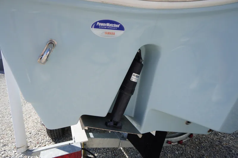 Slide: The Image of 2024 Tidewater 232 LXF boat stern with PowerMatched Yamaha system warranty sticker. - 15