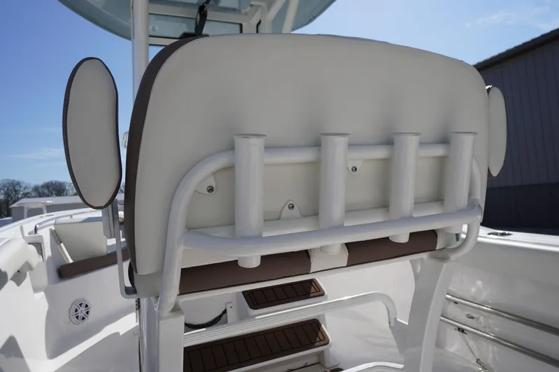 Slide: The Image of 2024 Tidewater 232 LXF boat interior with rod holders and seating. - 25