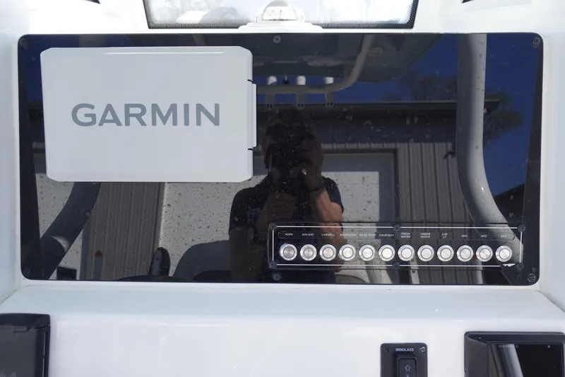 Slide: The Image of Dashboard of 2024 Tidewater 232 LXF boat with Garmin navigation system. - 33