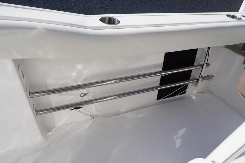Slide: The Image of 2024 Tidewater 232 LXF boat interior with stainless steel rod holders. - 34
