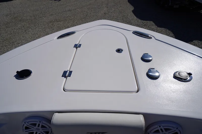 Slide: The Image of 2024 Tidewater 232 LXF boat deck with storage hatch and fittings. - 38