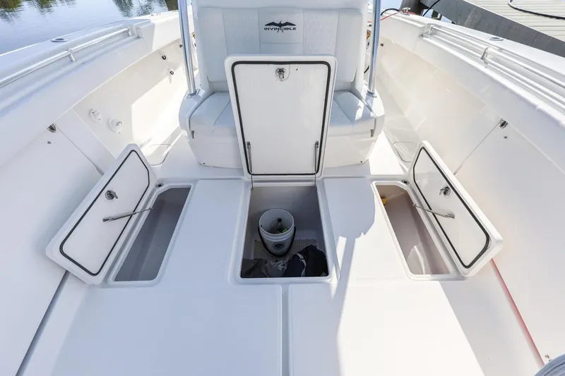 Slide: The Image of 2016 Invincible 39 Open Fisherman boat with open storage compartments on deck. - 16