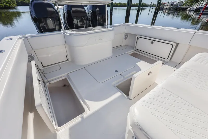 Slide: The Image of 2016 Invincible 39 Open Fisherman boat interior with storage compartments and seating. - 23