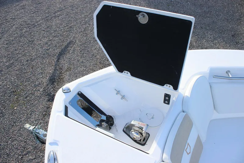 Slide: The Image of 2026 Sea Fox 288 Commander boat anchor compartment with open hatch, showcasing storage features. - 19