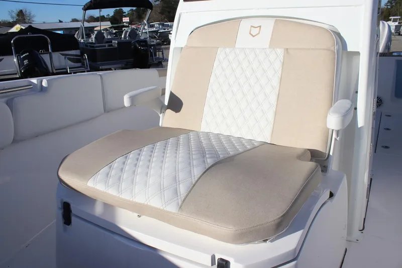 Slide: The Image of Luxurious seating on 2026 Sea Fox 288 Commander boat, featuring beige and white upholstery. - 21