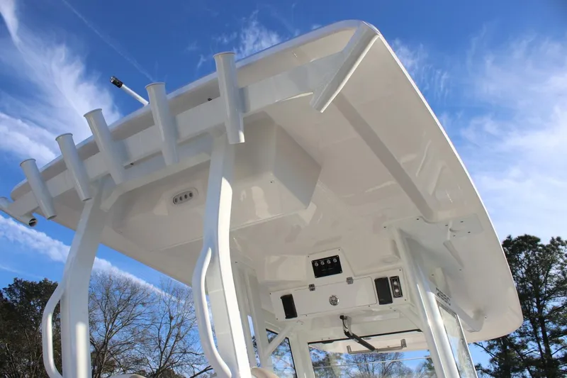 Slide: The Image of 2026 Sea Fox 288 Commander boat's T-top against a clear blue sky. - 25