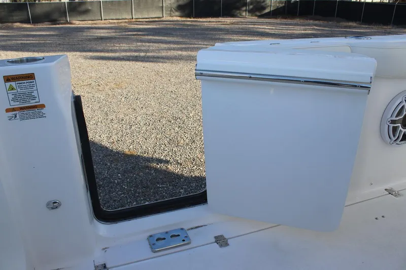 Slide: The Image of 2026 Sea Fox 288 Commander boat door with warning labels and speaker. - 27