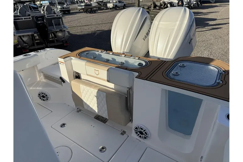 Slide: The Image of 2026 Sea Fox 288 Commander boat interior with Yamaha engines and seating area. - 28