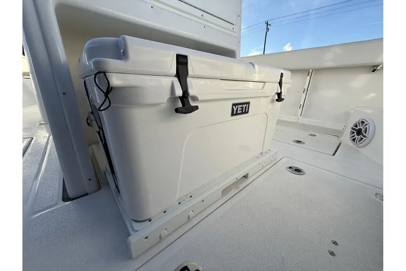 Slide: The Image of 2026 Sea Fox 288 Commander boat deck with Yeti cooler secured. - 31