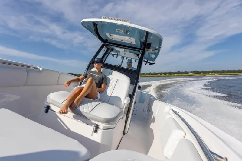 Slide: The Image of Manufacturer Provided Image: 2025 Sea Fox 288 Commander cruising on open water with passengers relaxing. - 4