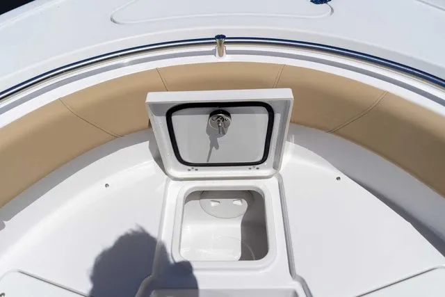 Slide: The Image of 2026 Sportsman Heritage 231 Center Console bow storage compartment. - 14