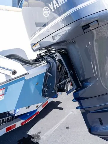 Slide: The Image of Outboard motor of a 2026 Sportsman Heritage 231 Center Console boat. - 17